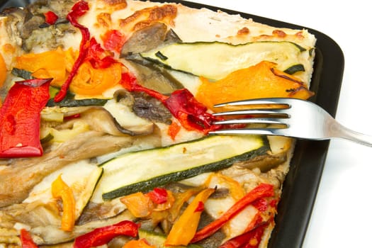 slice of pizza with fresh vegetables