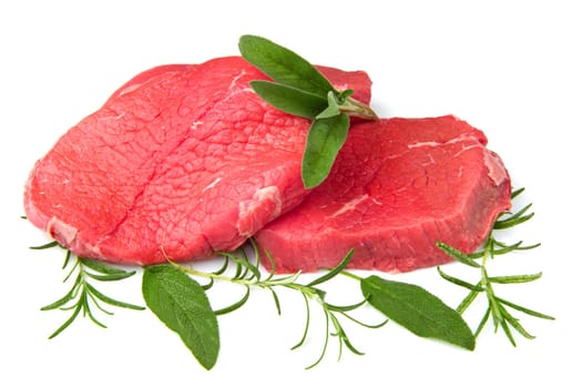 a red meat with sage and rosemary isolated on white background