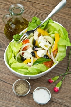 Feta salad with tomatoes, black olives  and fresh vegetables