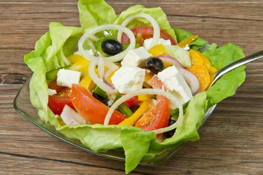 Feta salad with tomatoes, black olives  and fresh vegetables