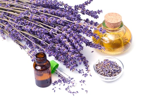 lavender flowers with oil  isolated on white background