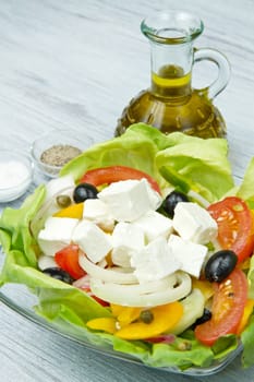 Feta salad with tomatoes, black olives  and fresh vegetables