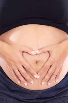 Adorable pregnant a over white background