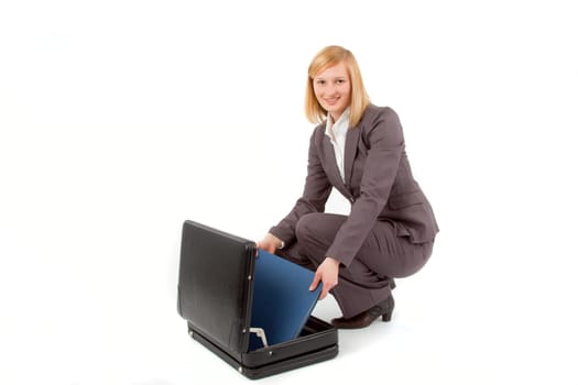 Young woman with briefcase and folder