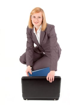 Young woman with briefcase and folder