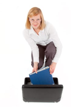Young woman with briefcase and folder