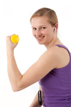 Sporty young woman with dumbbells