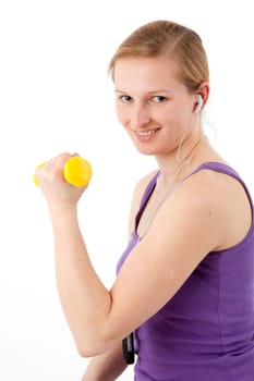 Sporty young woman with dumbbells