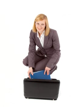 Young woman with briefcase and folder