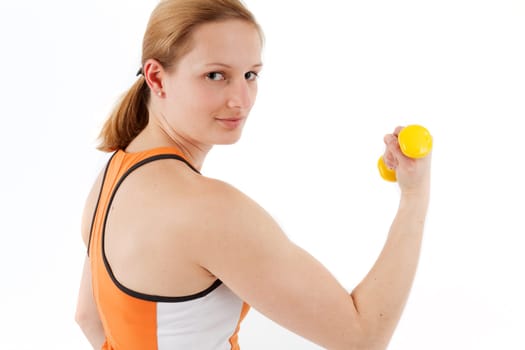 Young woman with dumbbell