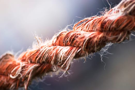 close up image of an used stretched rope