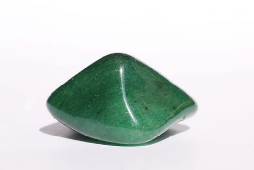 Aventurine gem laid on white