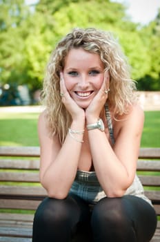 Exterior portrait of young smiling woman