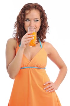 Beautiful smiling woman drinking orange juice from glass isolated on white