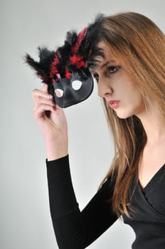 Mystery concept - woman in mask