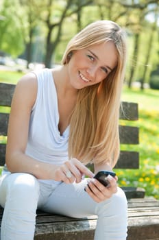 Mobile communication - smiling teenager