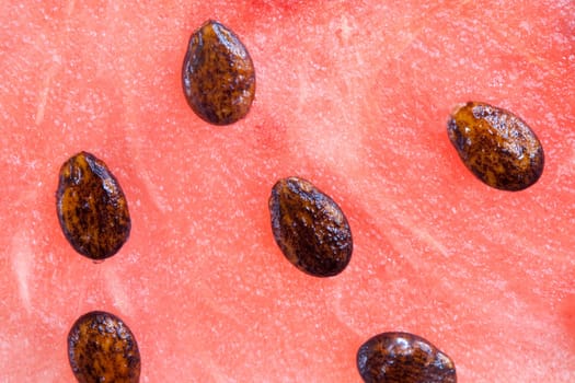Tasty pulp of watermelon with many seeds