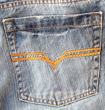 Photo of a pocket jeans with yellow thread