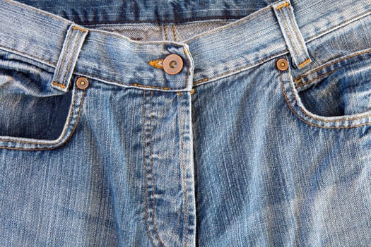 Photo of a pocket jeans with yellow thread