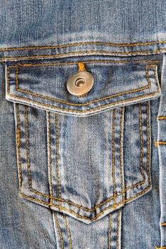 Photo of a pocket jeans with yellow thread