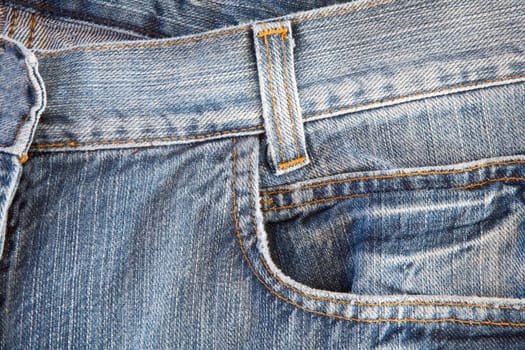 Photo of a pocket jeans with yellow thread