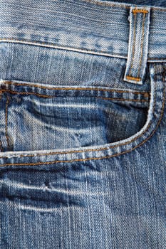 Photo of a pocket jeans with yellow thread