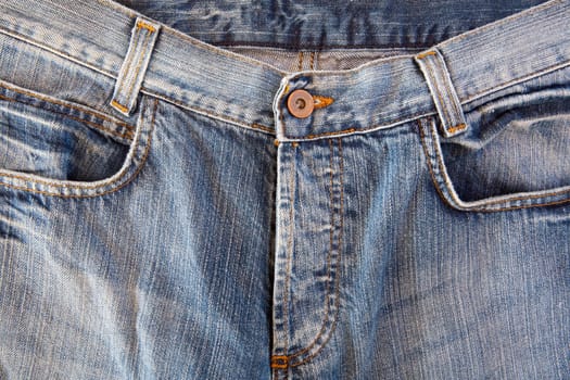 Photo of a pocket jeans with yellow thread