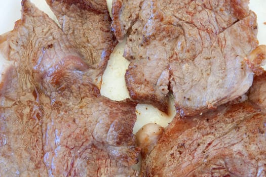 Cooked pork fillets. Example of food protein