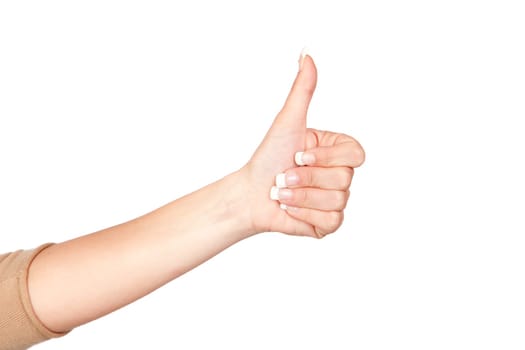 Hand of a woman with beautiful nails Ok signal
