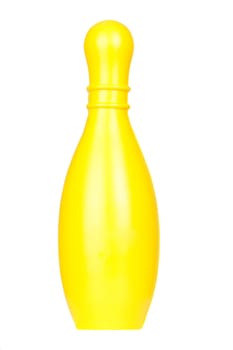 Yellow plastic bolus isolated on white background
