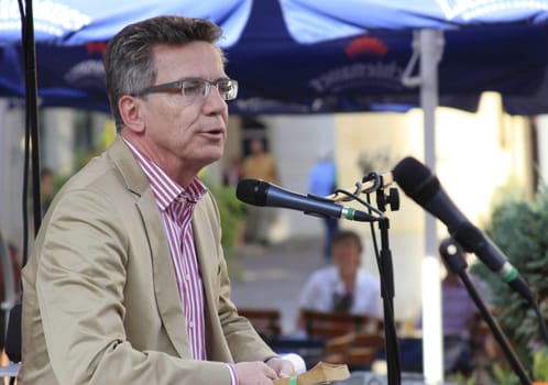 Federal Minister of Defence Thomas de Maizière reads from Alexandre Dumas' "Three Musketeers"" at the Meissen Literature Days 2011"