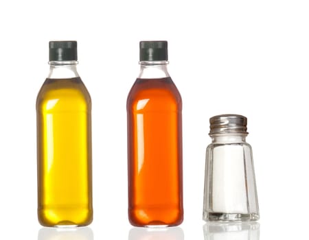 Bottles of oil, vinegar and salt boat isolated on white background