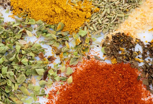 Many spices of different colours. Wealth of flavors