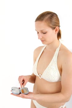 Young woman with pill box before taking
