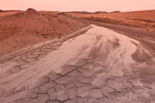 Mud Volcanoes and a sky with clouds