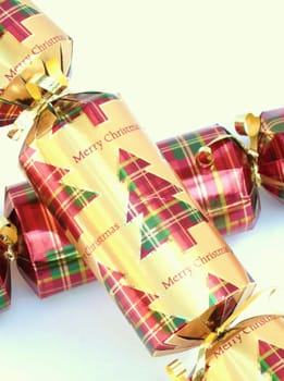 Close up of two festive Christmas crackers