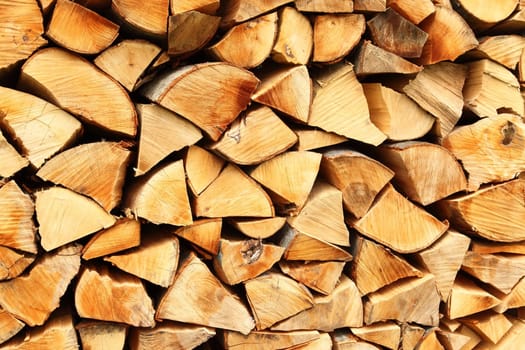 Pile of chopped fire wood prepared for winter
