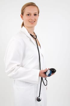 Young female doctor with stethoscope
