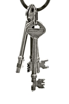 old keys closeup on white background.