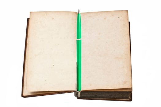 Old book and pen isolated on white background