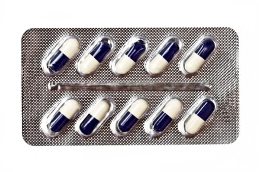 capsules packed in blister isolated on white