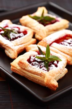 Delicious Cherry puff pastry with powdered sugar