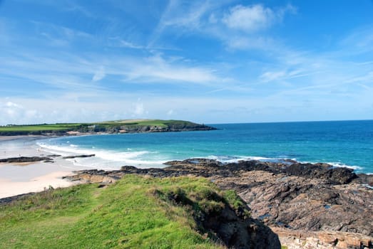 Harlyn Bay in Cornwall under a ble summer sky