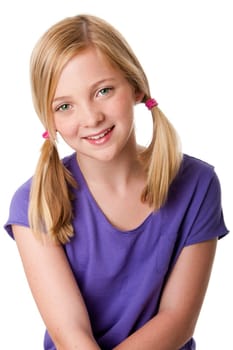 Beautiful cute happy teenager girl with pigtails, blond hair and freckles, isolated.