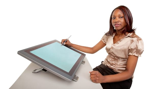 An African American Woman is working on a digital tablet.