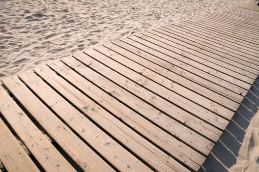 wooden catwalk on the Norssee beach in Bensersiel / East Frisia