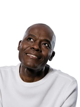 Portrait of an expressive Afro American man smiling with eyes wide open in studio on white isolated background