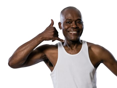 Portrait of a friendly afro American man showing call me gesture in studio on white isolated background