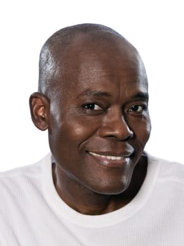 Close-up portrait of an attractive afro American man smiling in studio on white isolated background