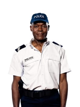 Portrait of an afro American mature police officer standing in studio on white isolated background